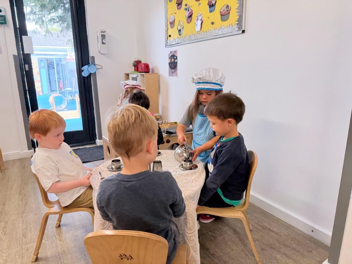 Practitioner leading a tea ceremony activity at Unique Child Montessori Higham Hill