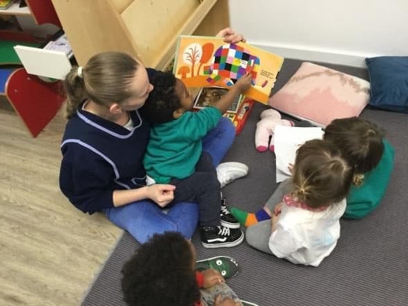 unique child montessori children playing with colorful toys together