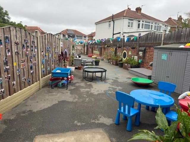 Outdoor play area at unique child montessori northolt