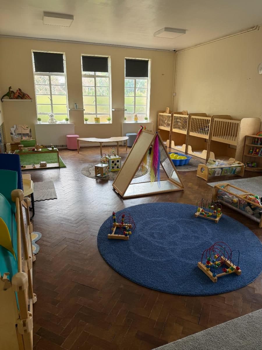 Unique child montessori bright playroom with learning stations