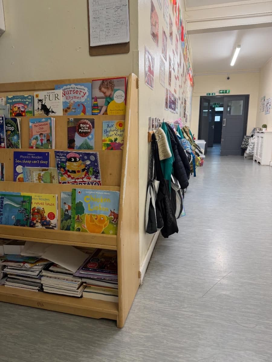 Book display and coat area at Unique Child Montessori Stockwell